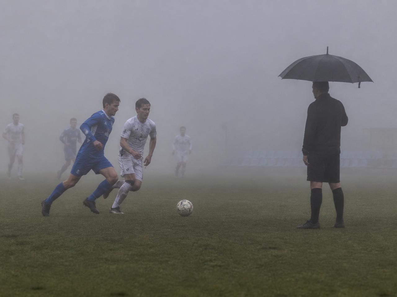 CELPIP Speaking Task 8 scene: a soccer field in thick fog