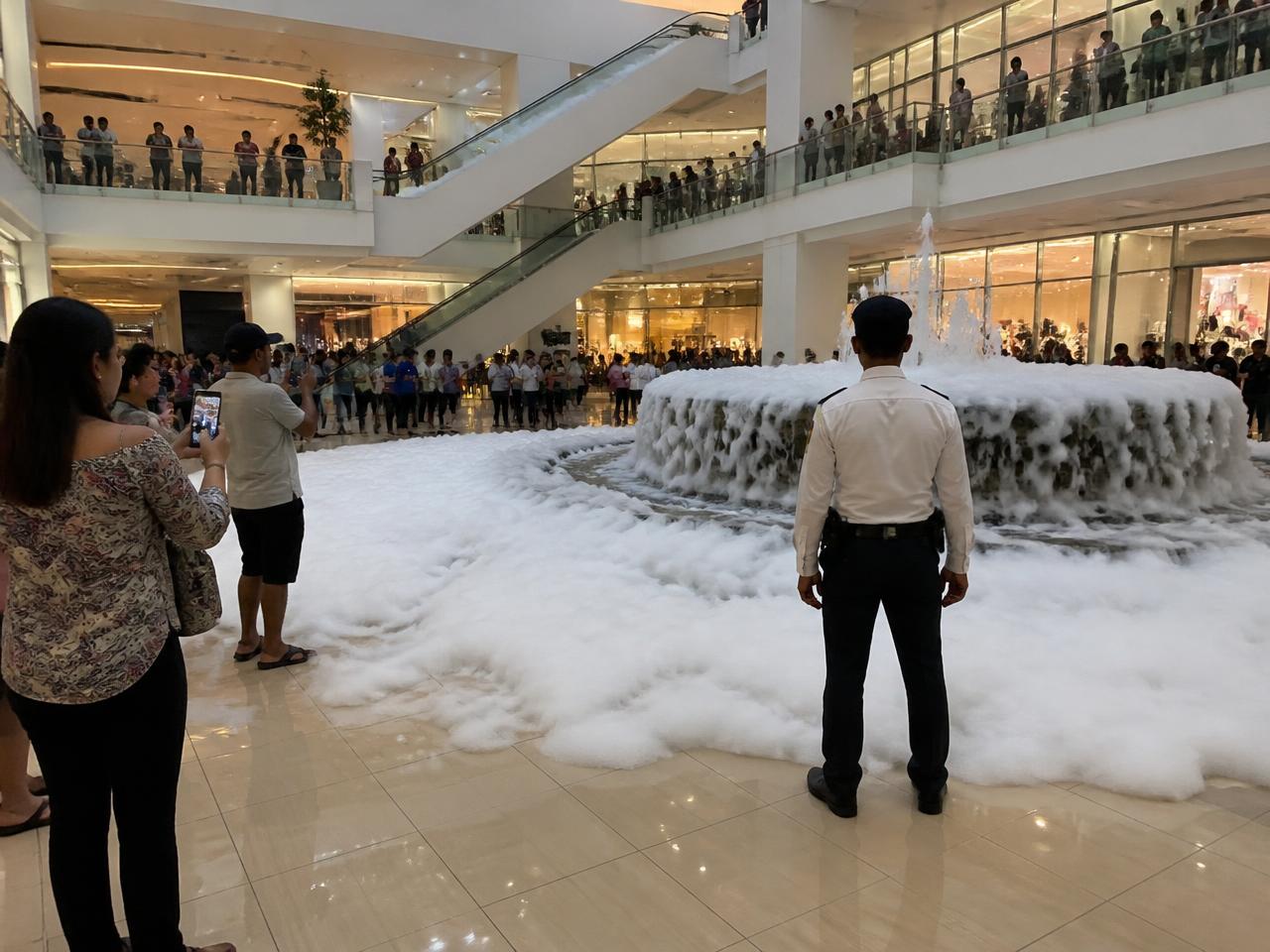 CELPIP Speaking Task 8 scene: a two-level shopping mall